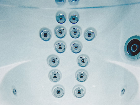Underwater image of accu-sage Sundance spa jets.