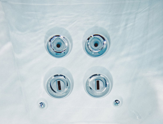 Underwater image of Sundance Spas percussive jet seat.